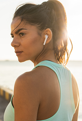 Athlete stops to visualize her run before beginning.